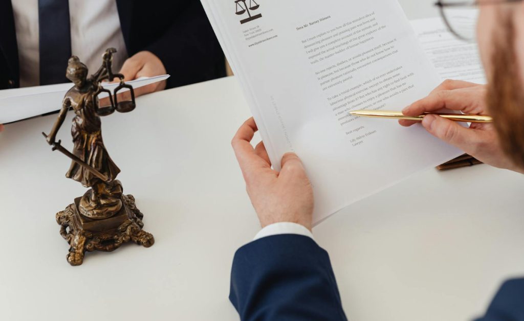 Attorney examining paperwork.