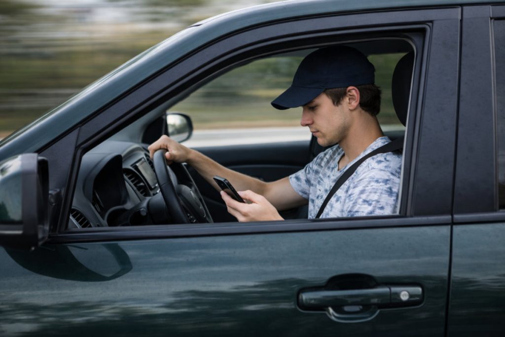 Distracted driver speeding.